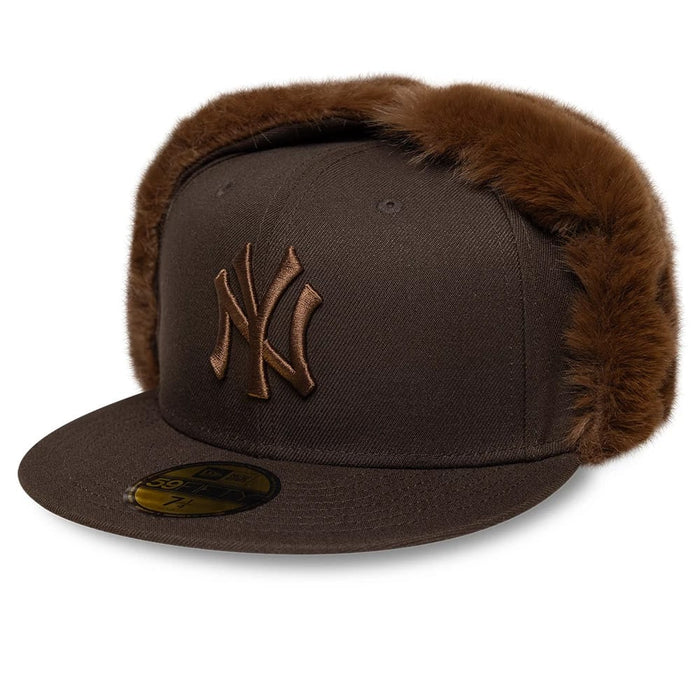 Pictured is this MLB World Series New York Yankees Dogear 59FIFTY Fitted cap in dark brown. 4